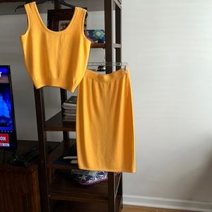 A two piece vintage golden yellow St. John separate. It has lots of stretch.